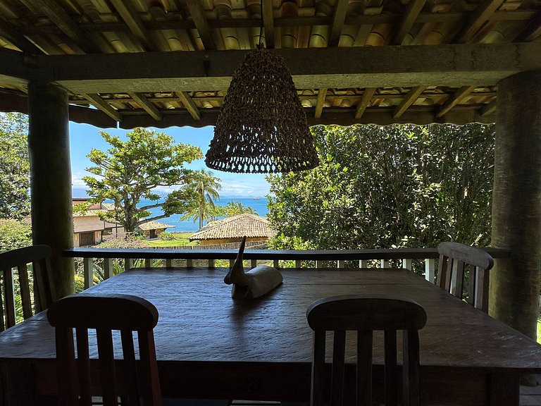 Casa em condomínio, píer de acesso ao mar e vista