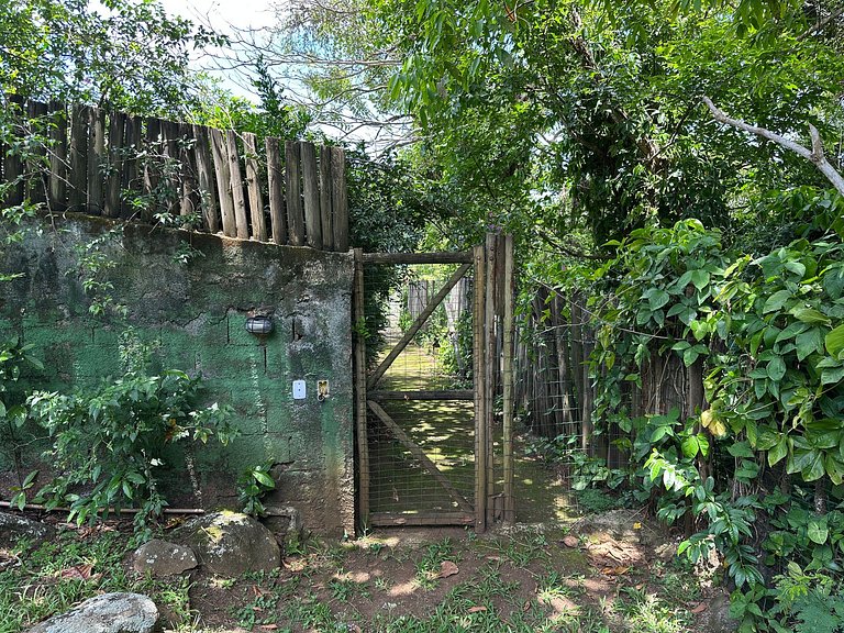 Casa em condomínio, píer de acesso ao mar e vista