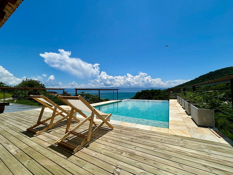 Casa em condomínio, piscina e vista mar