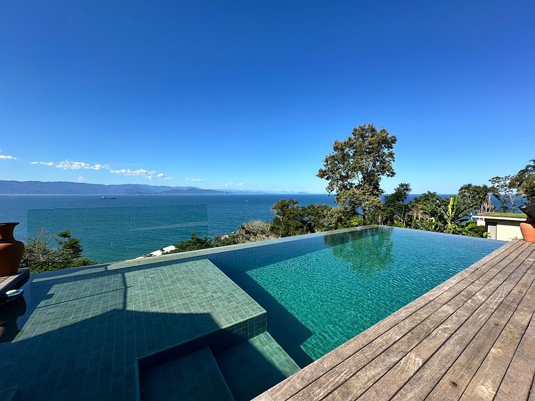 Condomínio pé na areia, piscina aquecida vista mar